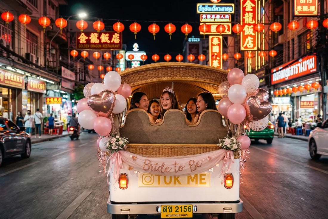 Bachelorette group in decorated pink tuk-tuk driving through Bangkok Chinatown at night with neon signs and red lanterns