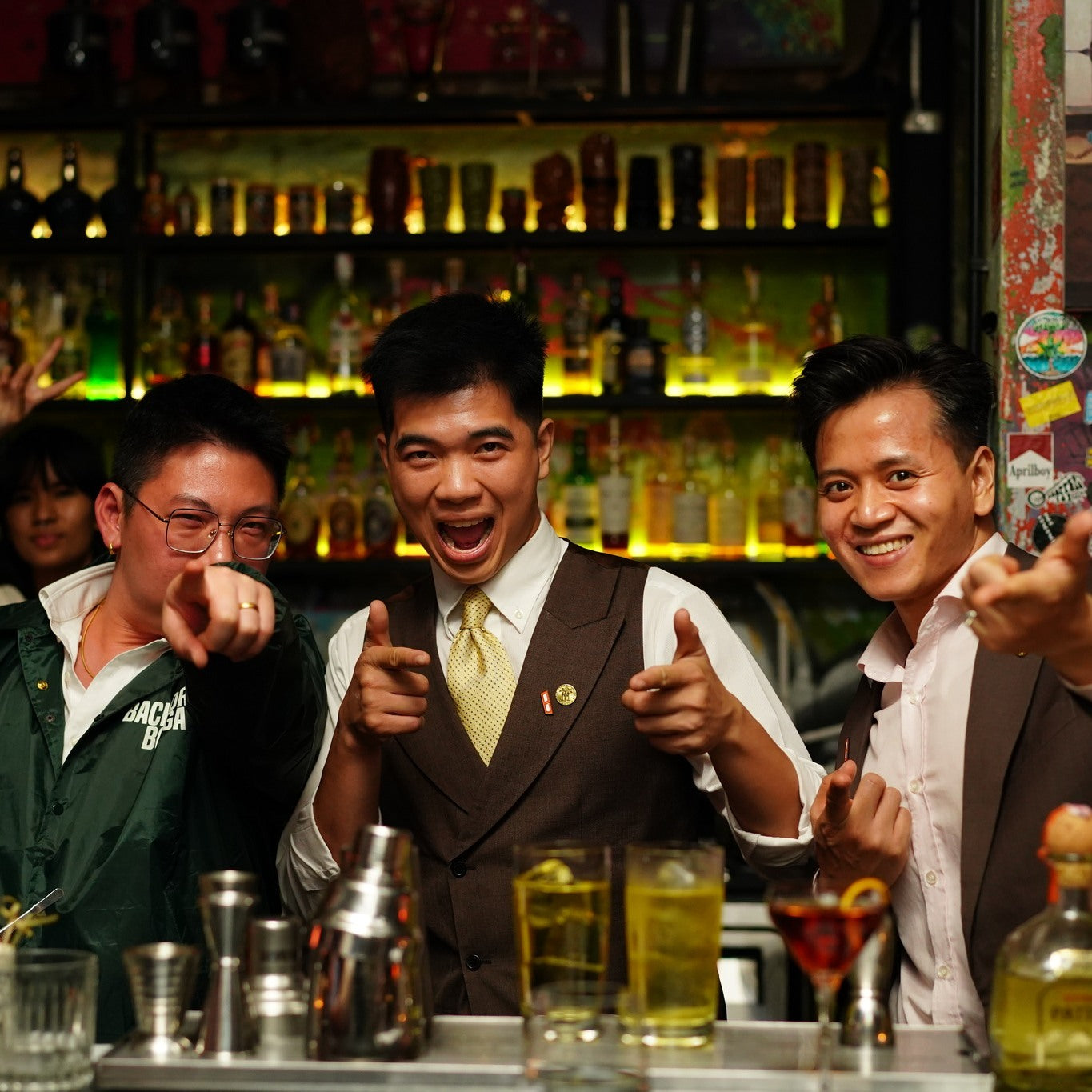 Friendly bartenders at Bangkok speakeasy during TukMe tuk tuk bar hopping nightlife tour