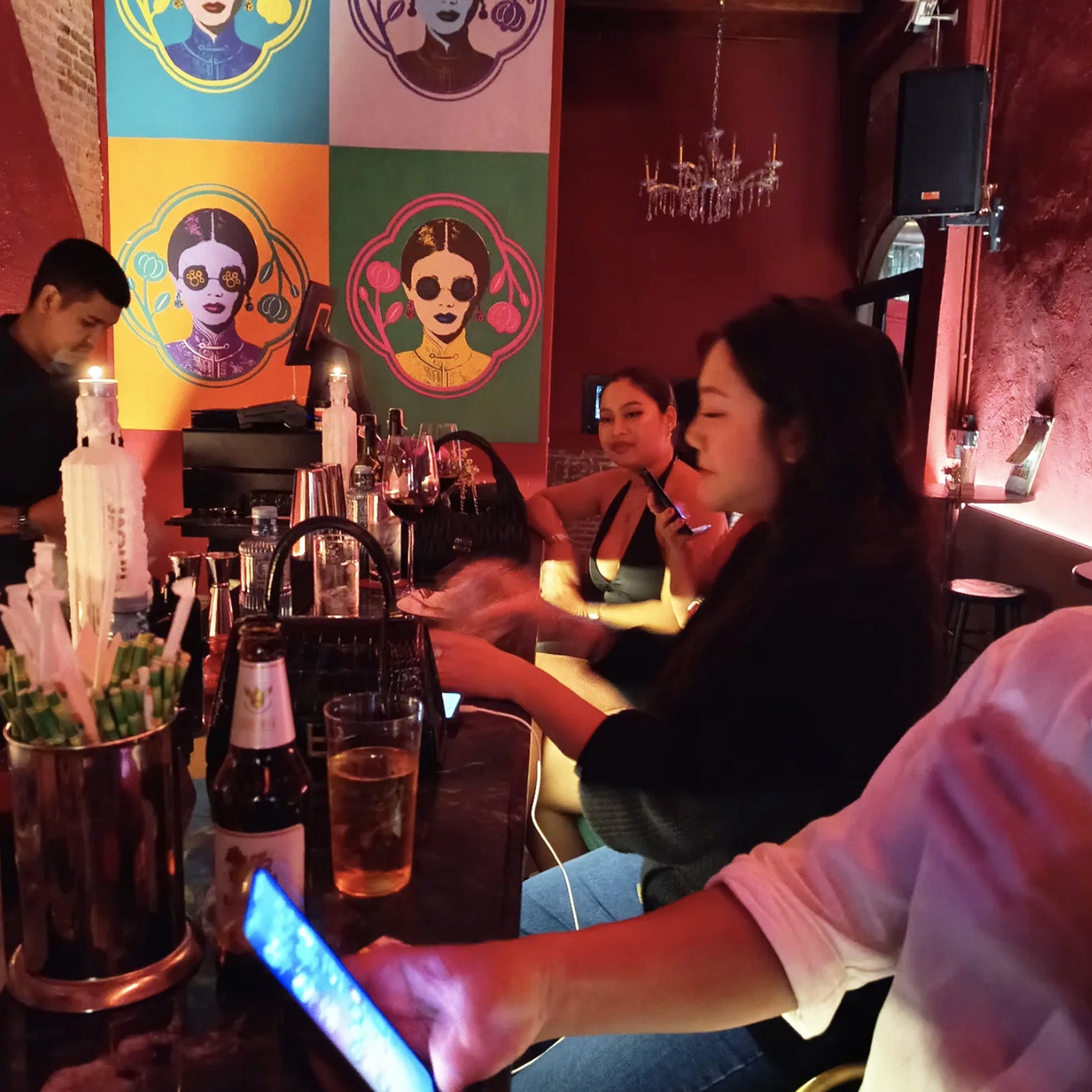 Guests enjoying drinks at trendy Bangkok speakeasy bar on TukMe tuk tuk bar hopping tour