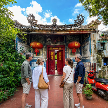 Travellers exploring a historic Chinese shrine in Talat Noi, old Bangkok Chinatown, on a TUK ME tuk tuk tour